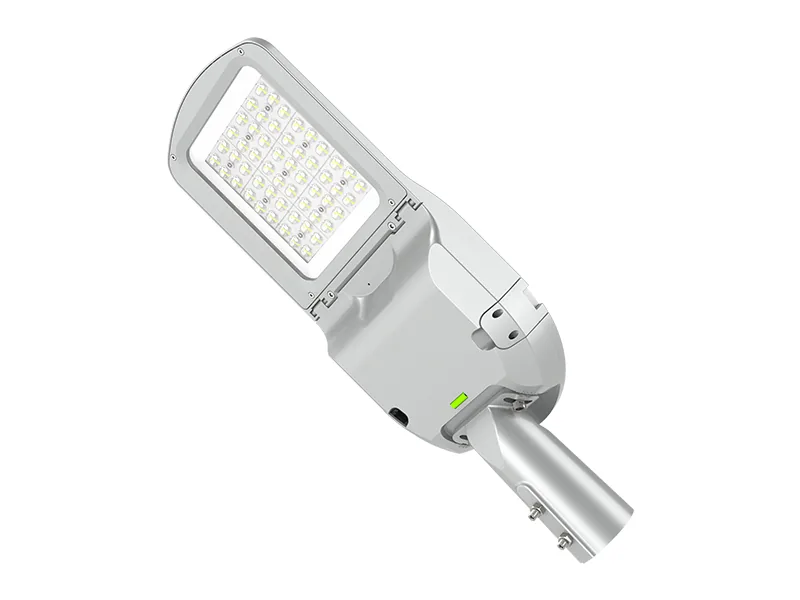 LED street light head with a tapered housing and a side entry spigot for pole mounting